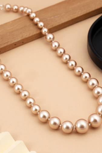 Gold color puwai necklace