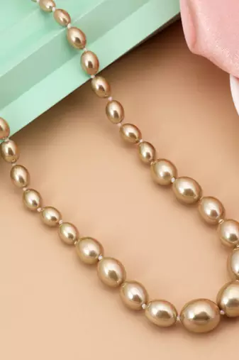 Gold color puwai necklace