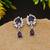 Purple color american diamond earrings