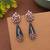 Blue color american diamond earrings