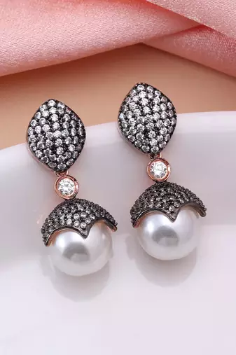 White color american diamond earrings