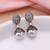 White color american diamond earrings
