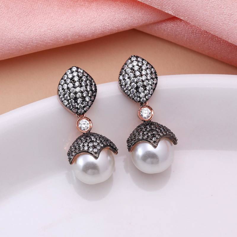 White color american diamond earrings