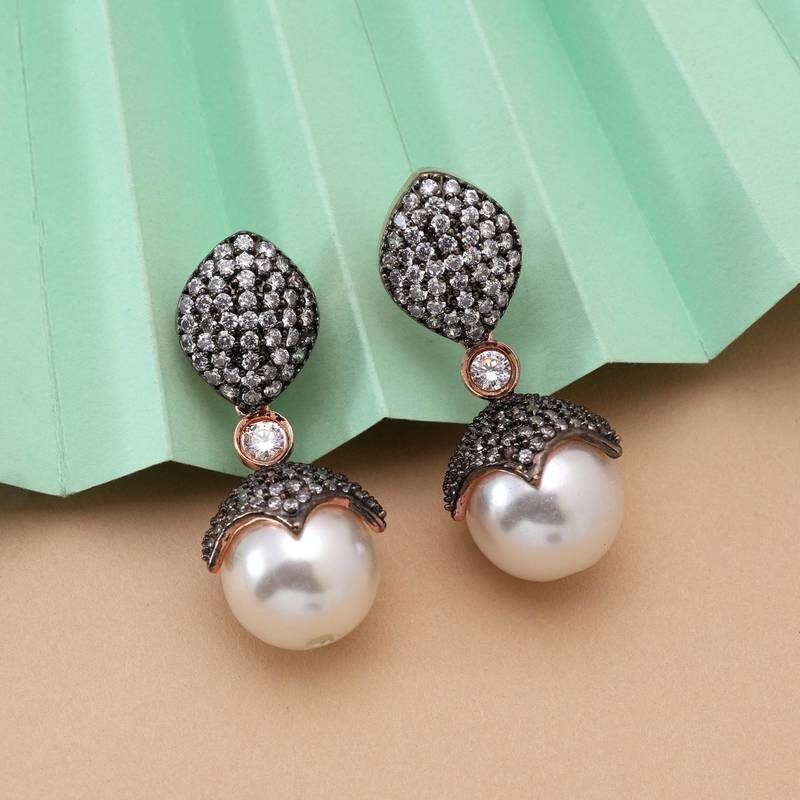 White color american diamond earrings