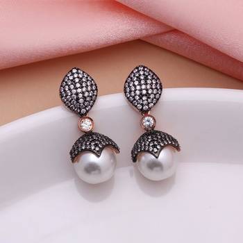 Light pink color american diamond earrings 1