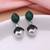 Green color american diamond earrings