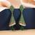 Green color american diamond earrings