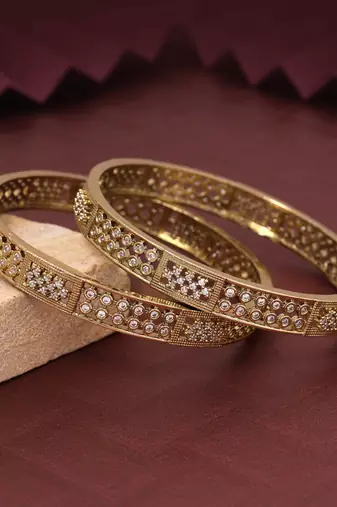 Gold color american diamond bangle size: 2.6