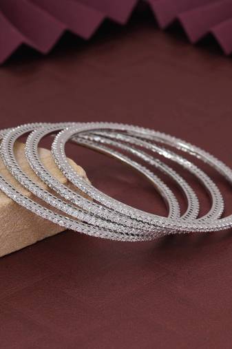 Silver color american diamond bangle size: 2.6