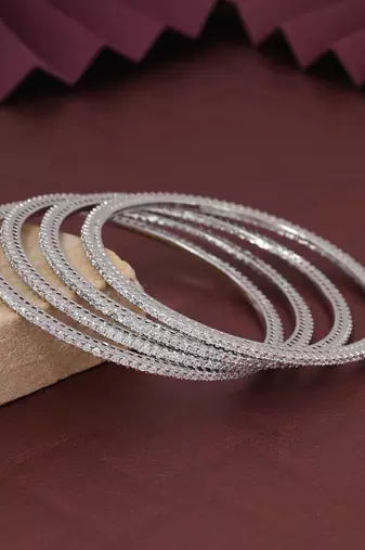 Silver color american diamond bangle size: 2.6