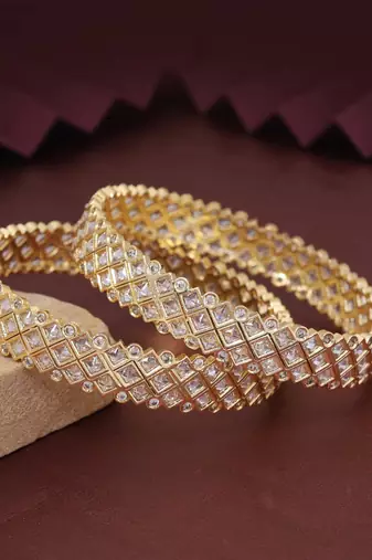 Gold color american diamond bangle size: 2.6