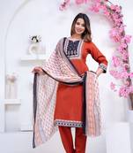 Floral printed orange round neck pure cotton kurta set with trouser & dupatta