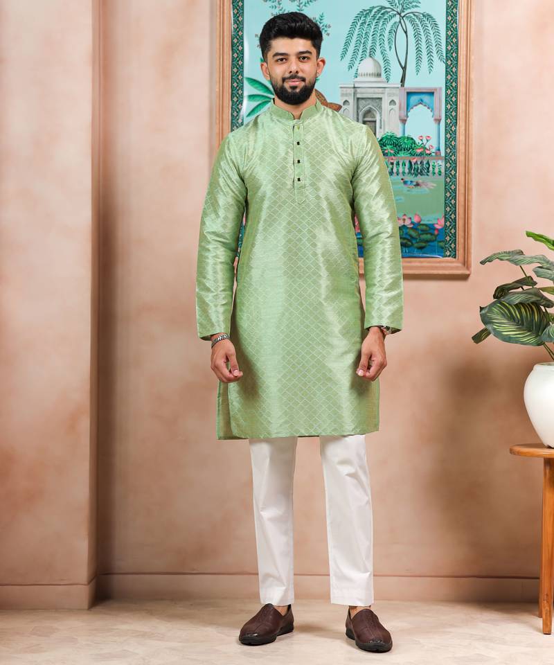 Pista color graceful partywear kurta payjama for mens ceremonial looks