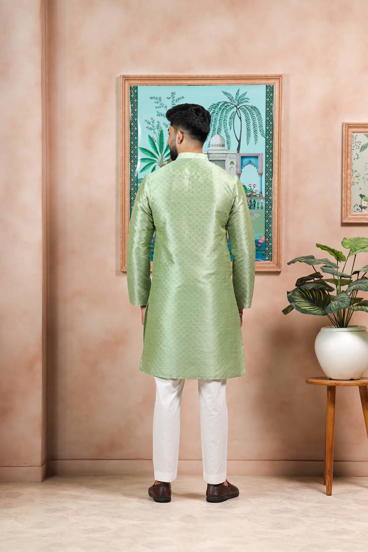 Pista color graceful partywear kurta payjama for mens ceremonial looks