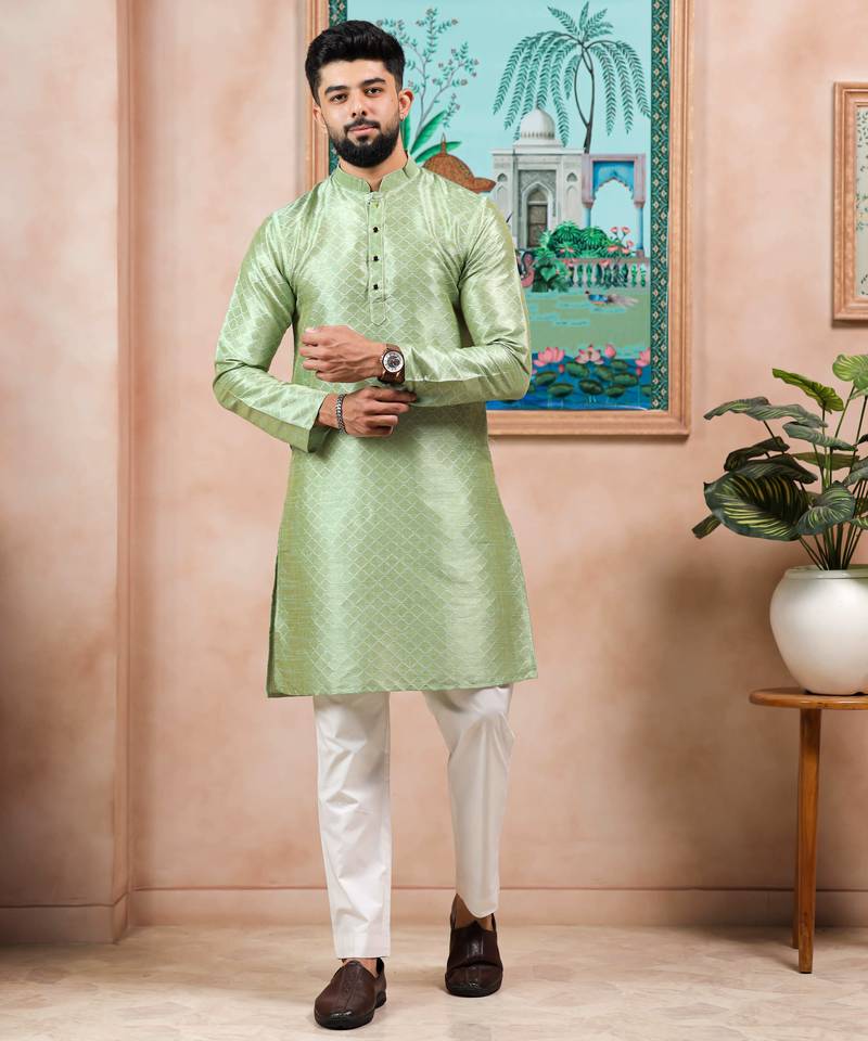 Pista color graceful partywear kurta payjama for mens ceremonial looks