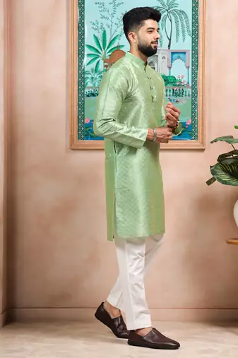Pista color graceful partywear kurta payjama for mens ceremonial looks