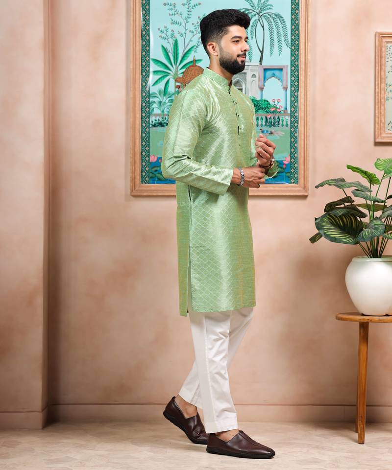 Pista color graceful partywear kurta payjama for mens ceremonial looks
