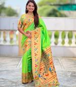 parrot green color paithani silk blend fabric woven meenakari jacquard graceful wedding saree