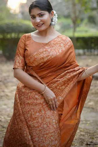 Orange handloom raw silk blend ethnic partywear saree
