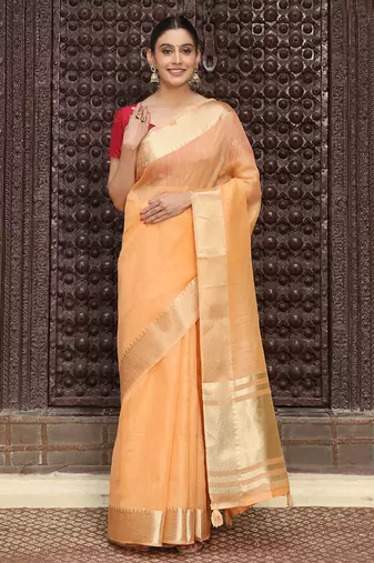 Orange color rich ethnic cotton based saree with rich woven designer looks