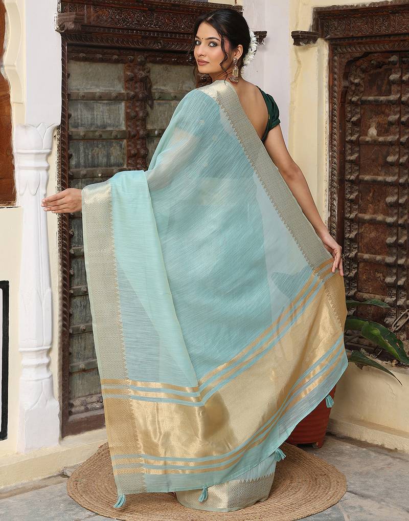 Sky blue color rich ethnic cotton based saree with rich woven designer looks