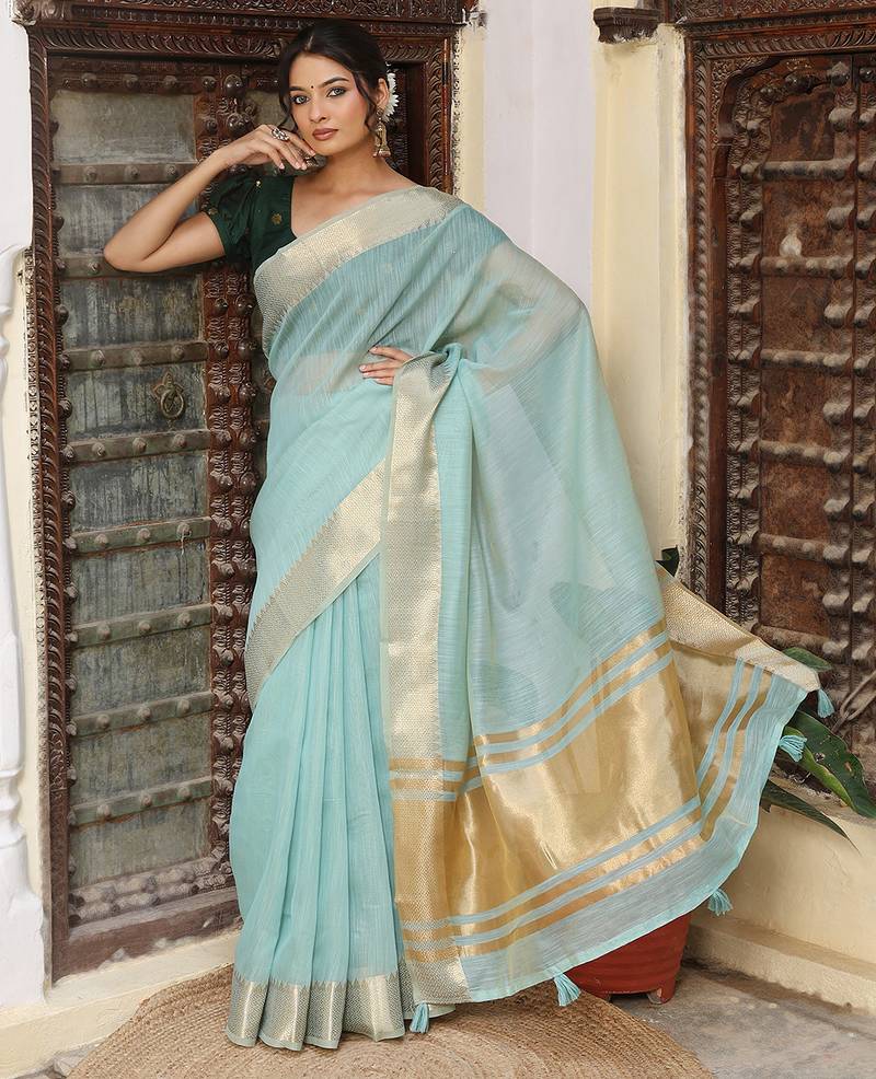 Sky blue color rich ethnic cotton based saree with rich woven designer looks