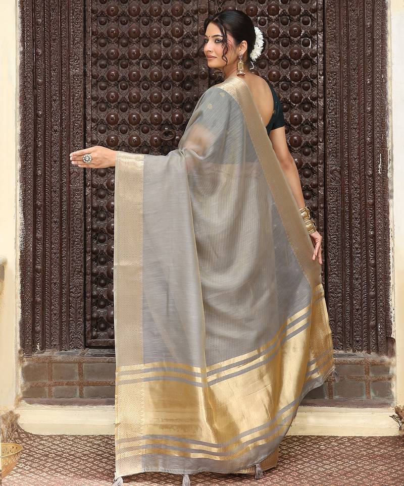 Gray color rich ethnic cotton based saree with rich woven designer looks