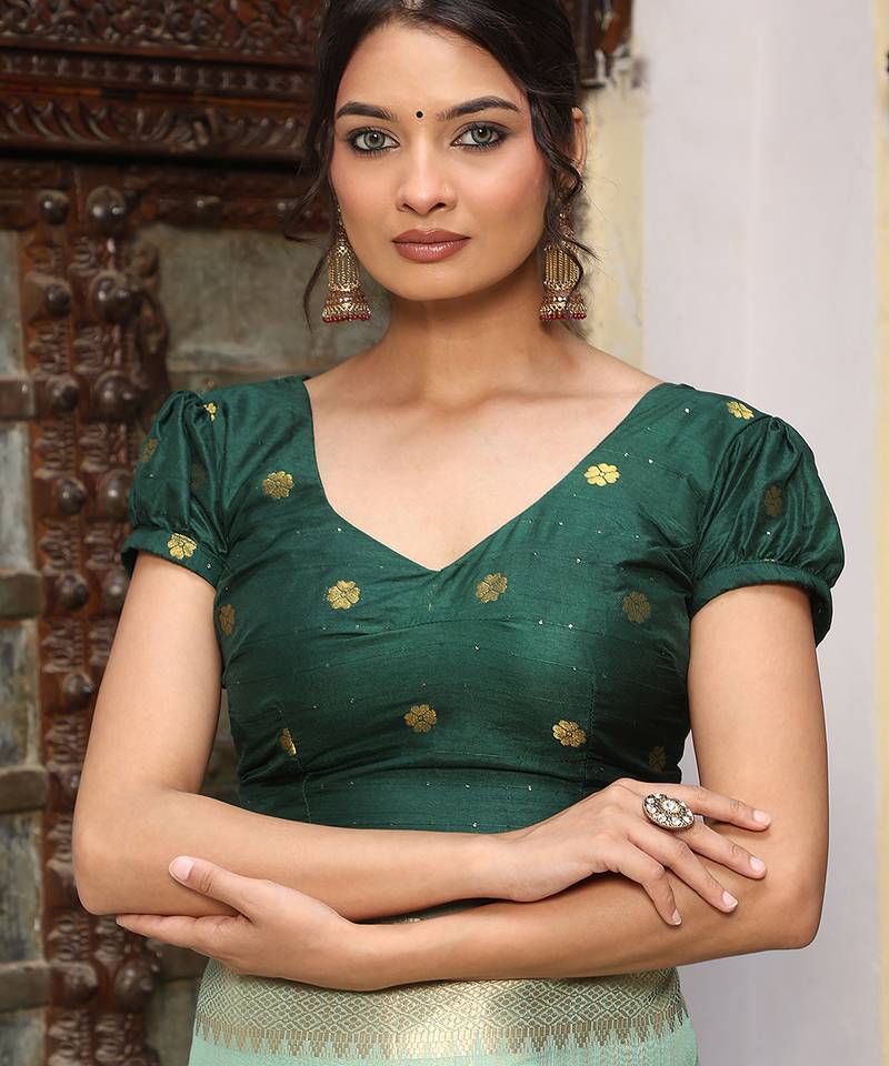 Sea green color rich ethnic cotton based saree with rich woven designer looks