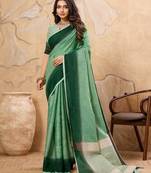 pista green color based fabric ethnic woven ceremonial saree