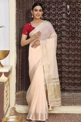 Peach color rich ceremonial looks cotton based woven designer saree