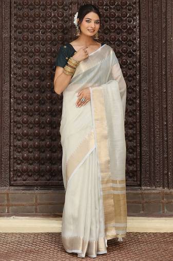 Grey color rich ceremonial looks cotton based woven designer saree