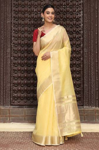 Yellow color rich ceremonial looks cotton based woven designer saree