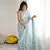Green color ethnic printed georgette fabric girlie partywear saree