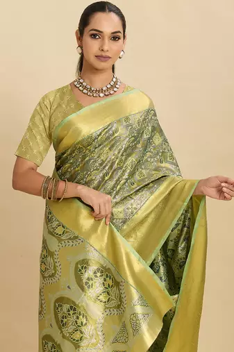 green graceful wevon zari silk blend partywear saree