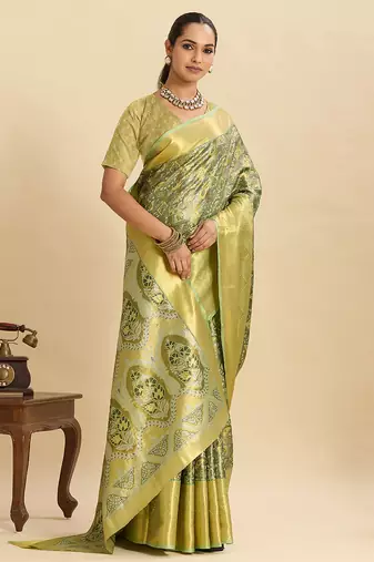 green graceful wevon zari silk blend partywear saree