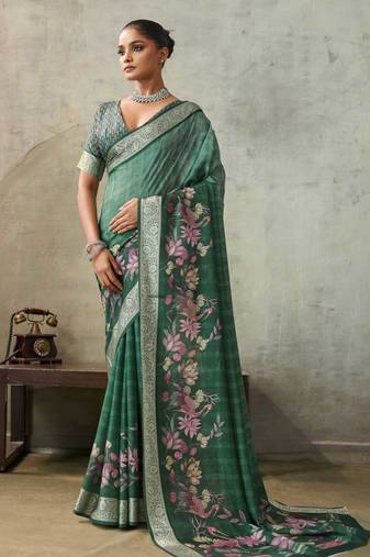 Green color ethnic rich looks partywear saree