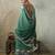 Green color ethnic rich looks partywear saree