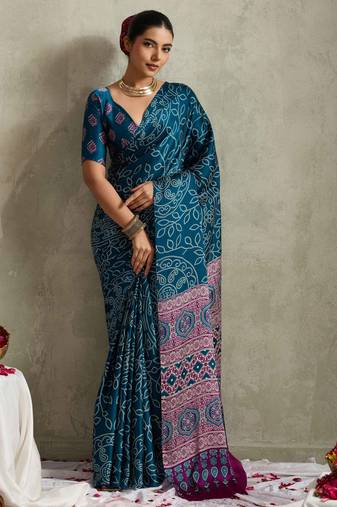 teal color rich looks designer bandhani printed elegant festive saree