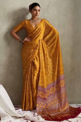 mustard color rich looks designer bandhani printed elegant festive saree