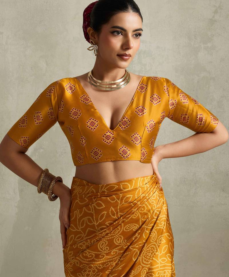 mustard color rich looks designer bandhani printed elegant festive saree
