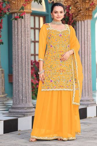 Yellow color graceful heavy embroidered palazzo dress for wedding looks