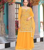 Yellow color graceful heavy embroidered palazzo dress for wedding looks