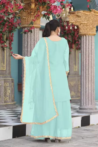 Sea green color graceful heavy embroidered palazzo set