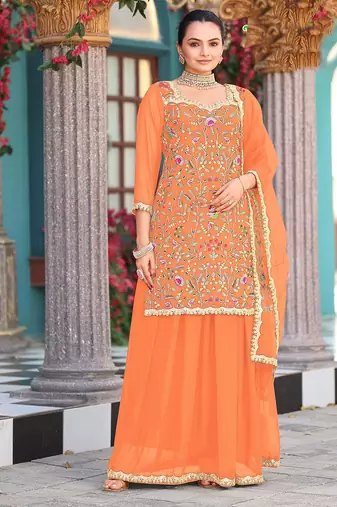 Orange color graceful heavy embroidered palazzo set