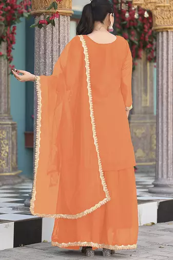 Orange color graceful heavy embroidered palazzo set