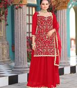 Red color graceful heavy embroidered palazzo suit