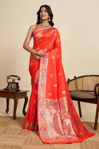 Coral red jacquard fabric saree with zari woven floral design & broad border     traditional saree with blouse piece