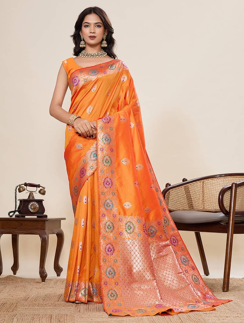 Orange jacquard fabric saree with zari woven floral design & broad border     traditional saree with blouse piece