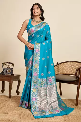 Turquoise jacquard fabric saree with zari woven floral design & broad border     traditional saree with blouse piece