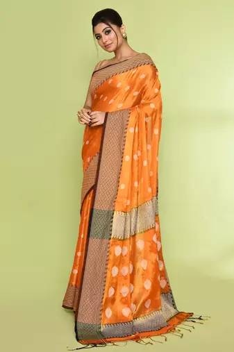 Women`s orange zari cotton tissue jamdani saree